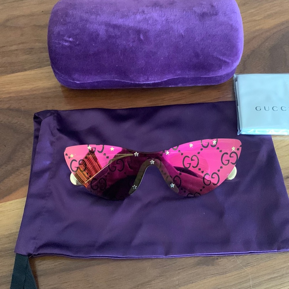 GUCCI gold rimless sunglasses with star studs and pink gg